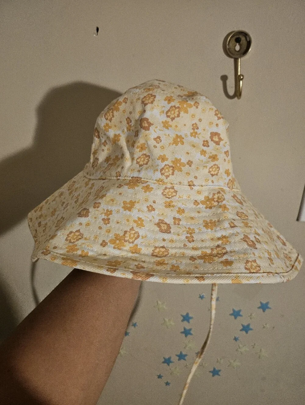 Lack of Color Holiday Bucket Hat in the Peach Bloom pattern